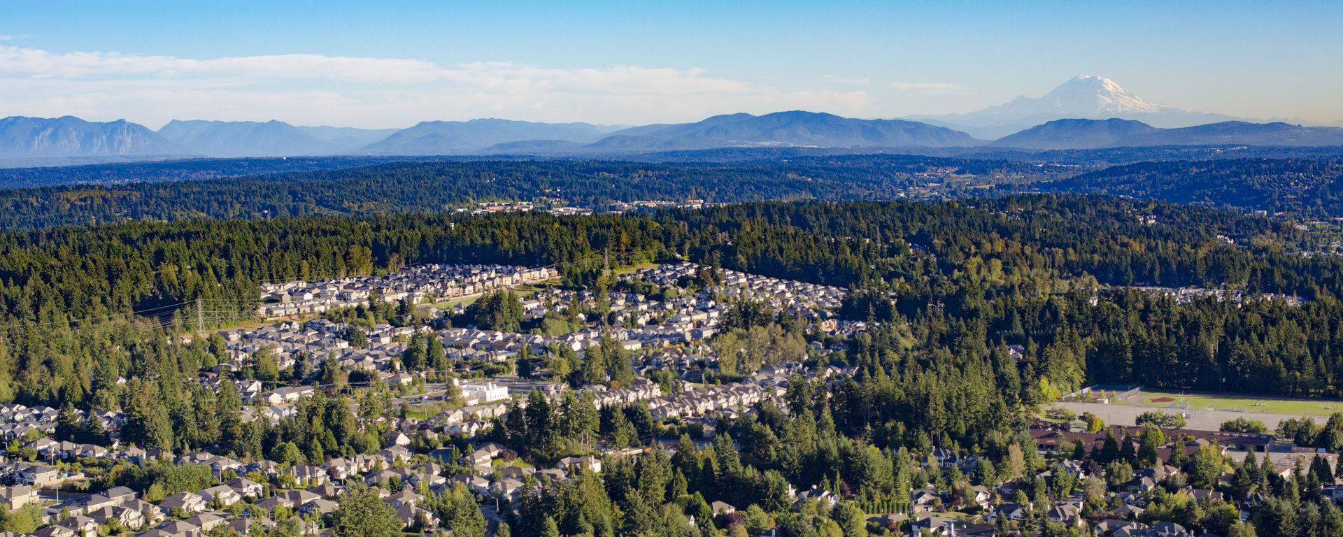 Mill Creek, Washington Suburban Forest Aerial - Mount Rainier and Cascade Mountains Backdrop